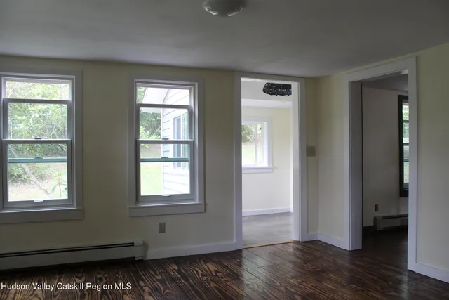 a view of a tree in a yard