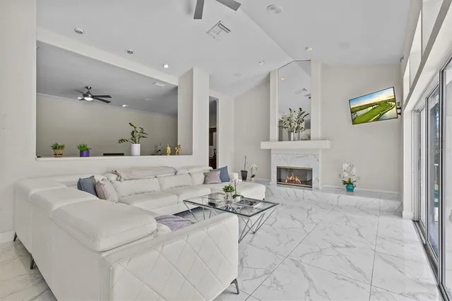 a view of a swimming pool with a chairs