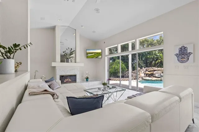 a view of a backyard with swimming pool