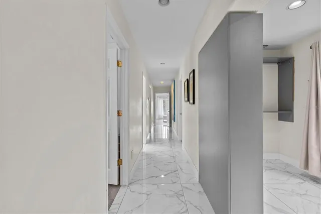 an aerial view of a house with a yard and a garden