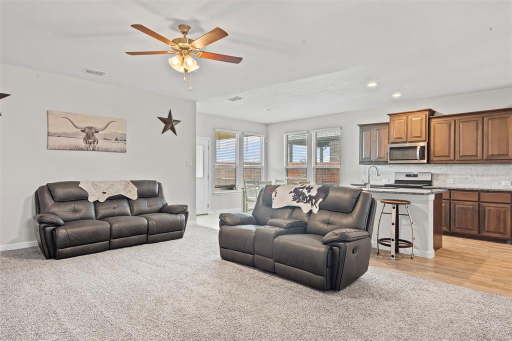 1104 Dublin Drive Cleburne, TX 76033 - Photo 12 of 39 Living room featuring recessed lighting, light colored carpet, and a ceiling fan