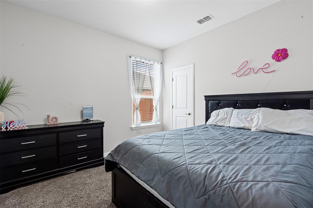 1104 Dublin Drive Cleburne, TX 76033 - Photo 18 of 39 View of carpeted bedroom