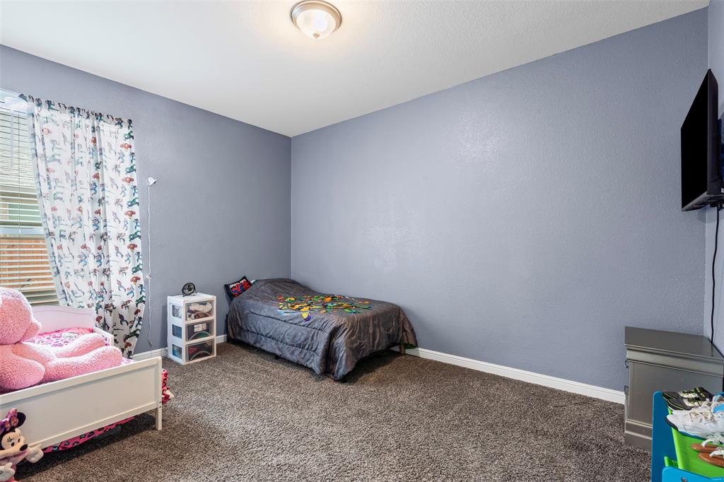 1104 Dublin Drive Cleburne, TX 76033 - Photo 19 of 39 Bedroom with carpet and baseboards