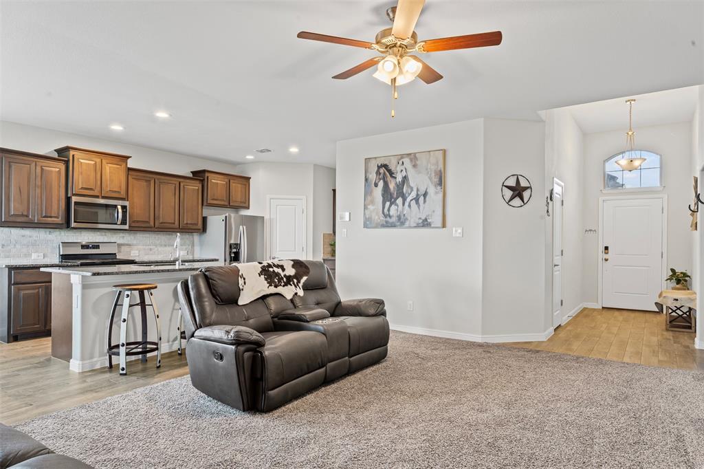1104 Dublin Drive Cleburne, TX 76033 - Photo 8 of 39 Living area featuring light wood-style floors, recessed lighting, and a ceiling fan