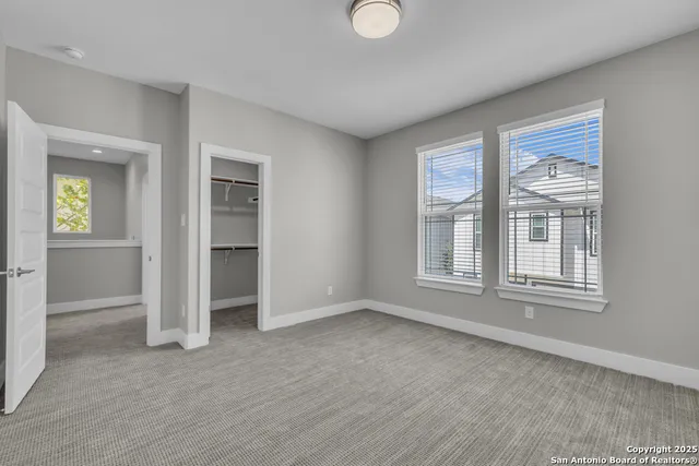 a utility room with washer and dryer