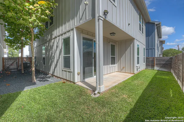 a front view of a building with garden