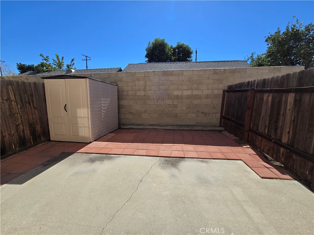 12235 Pine Street, Unit 18 Norwalk, CA 90650 - Photo 12 of 18 a view of a backyard