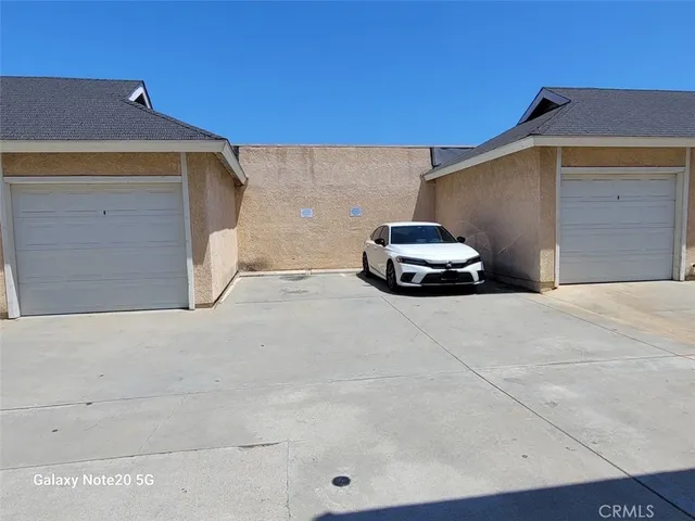 a car parked in front of a house