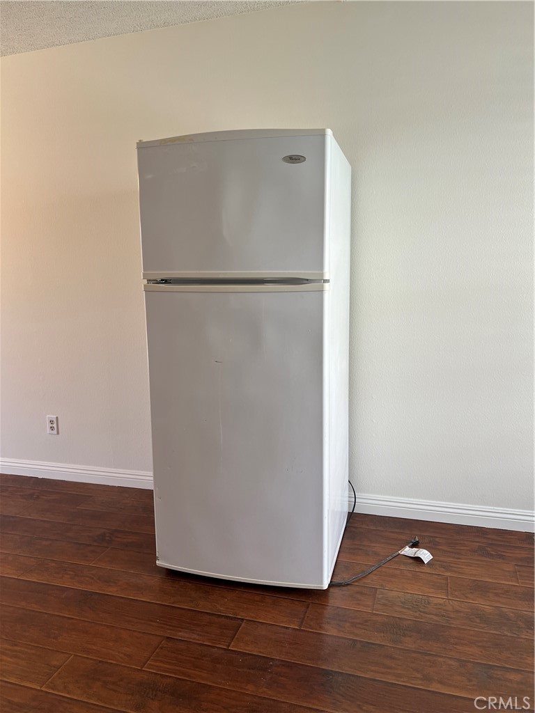 12235 Pine Street, Unit 18 Norwalk, CA 90650 - Photo 5 of 18 a view of a room with wooden floor
