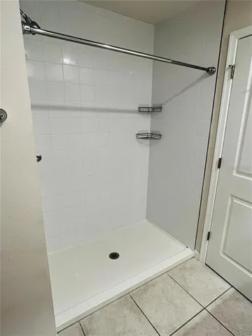 a bathroom with a bath tub