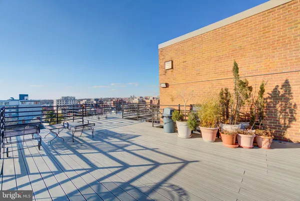a view of a terrace with sitting area