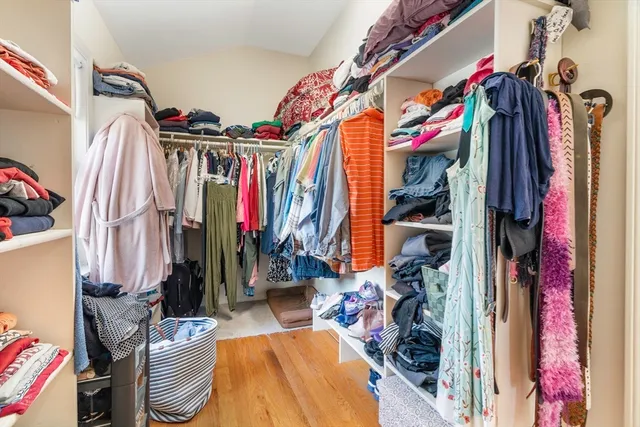 a view of yard with swimming pool and trees in the background