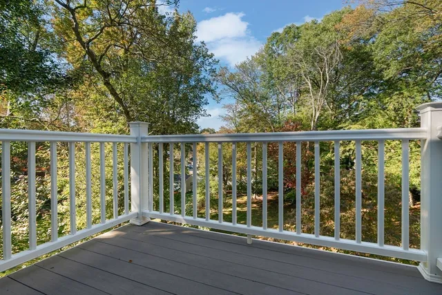a view of a livingroom with furniture and a ceiling fan