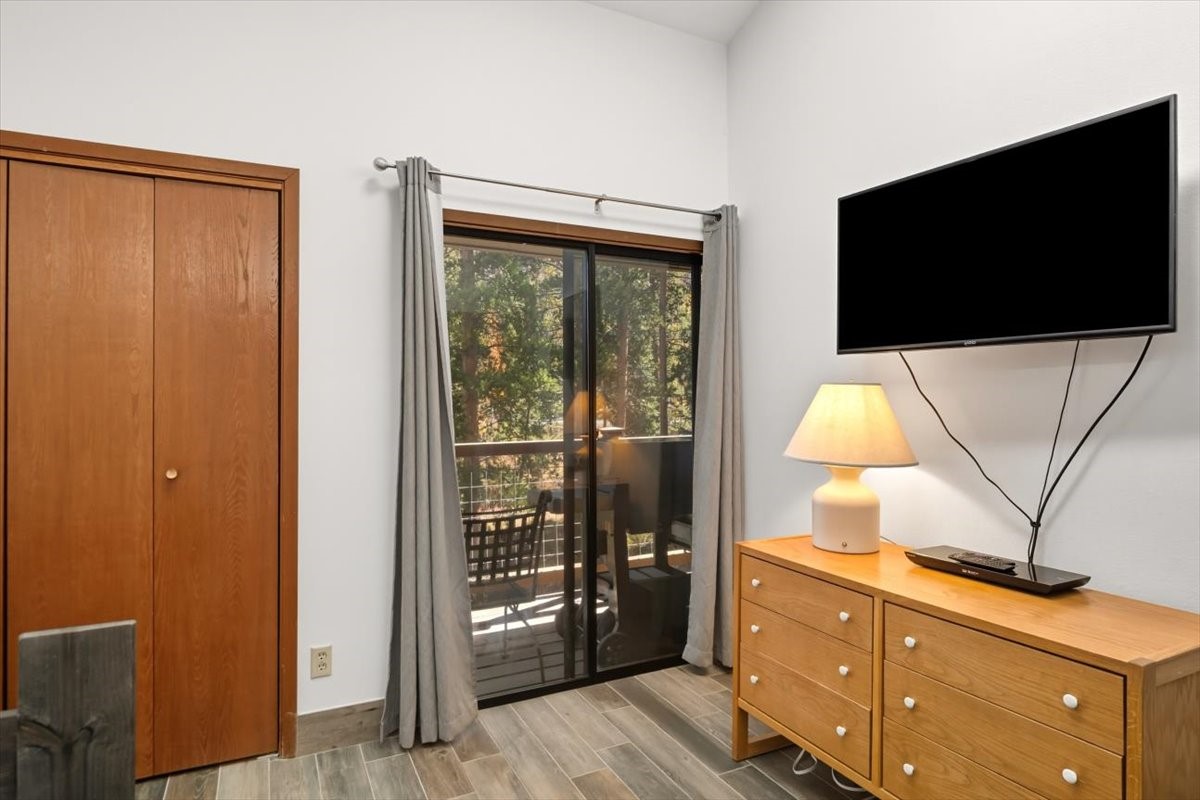 1937 Soda Ridge Road, Unit 1159 Keystone, CO 80435 - Photo 11 of 29 Doorway to outside featuring wood finished floors