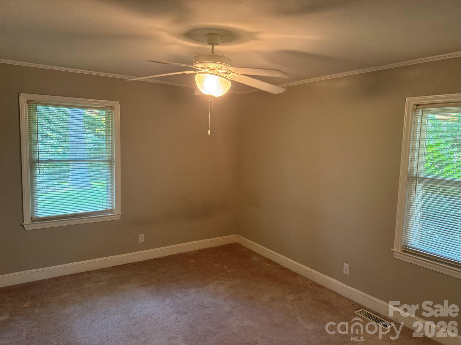 3160 Long Meadow Road Rock Hill, SC 29730 - Photo 12 of 17 an empty room with windows and closet