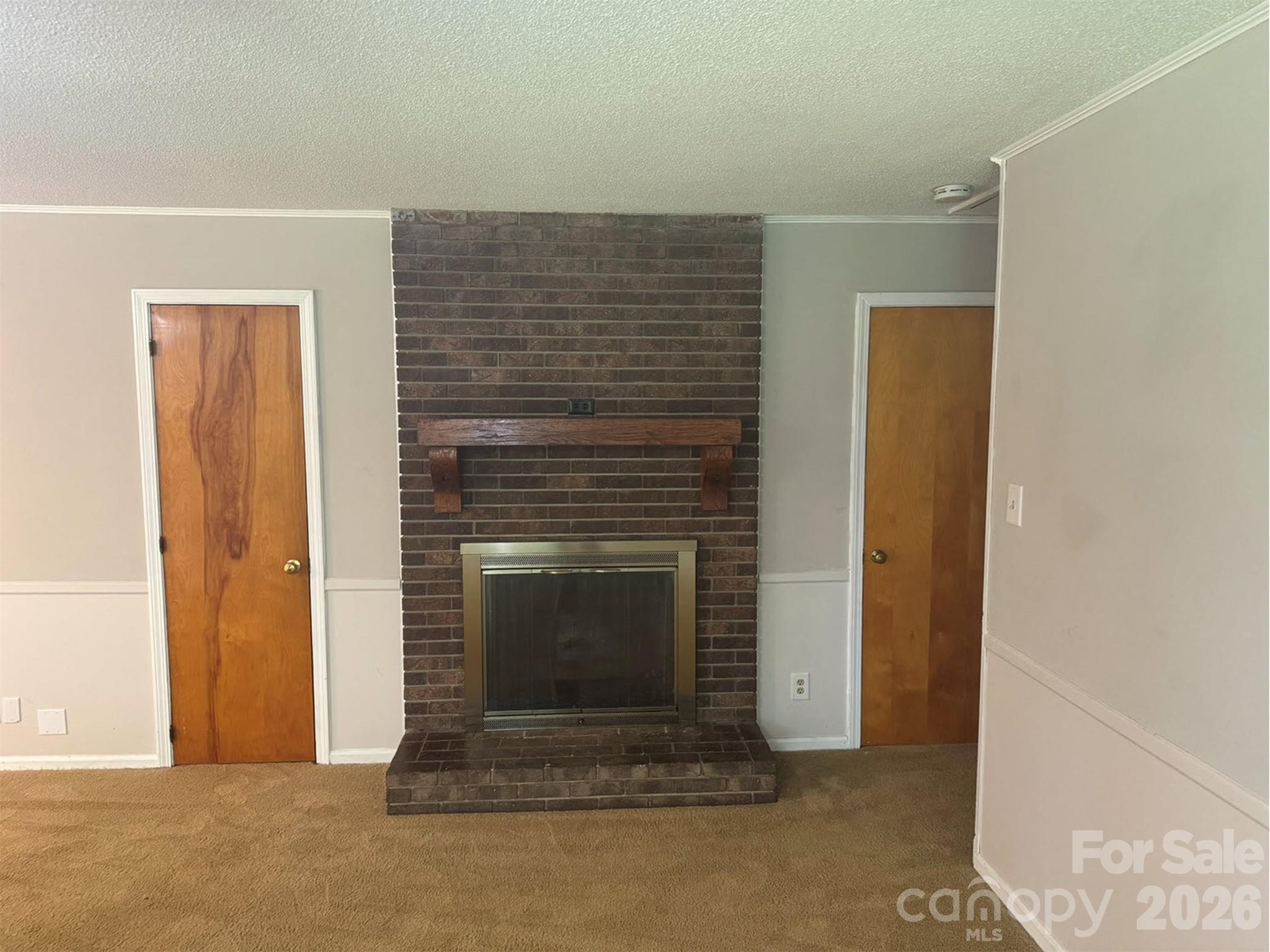 3160 Long Meadow Road Rock Hill, SC 29730 - Photo 9 of 17 a view of empty room with fireplace and a window