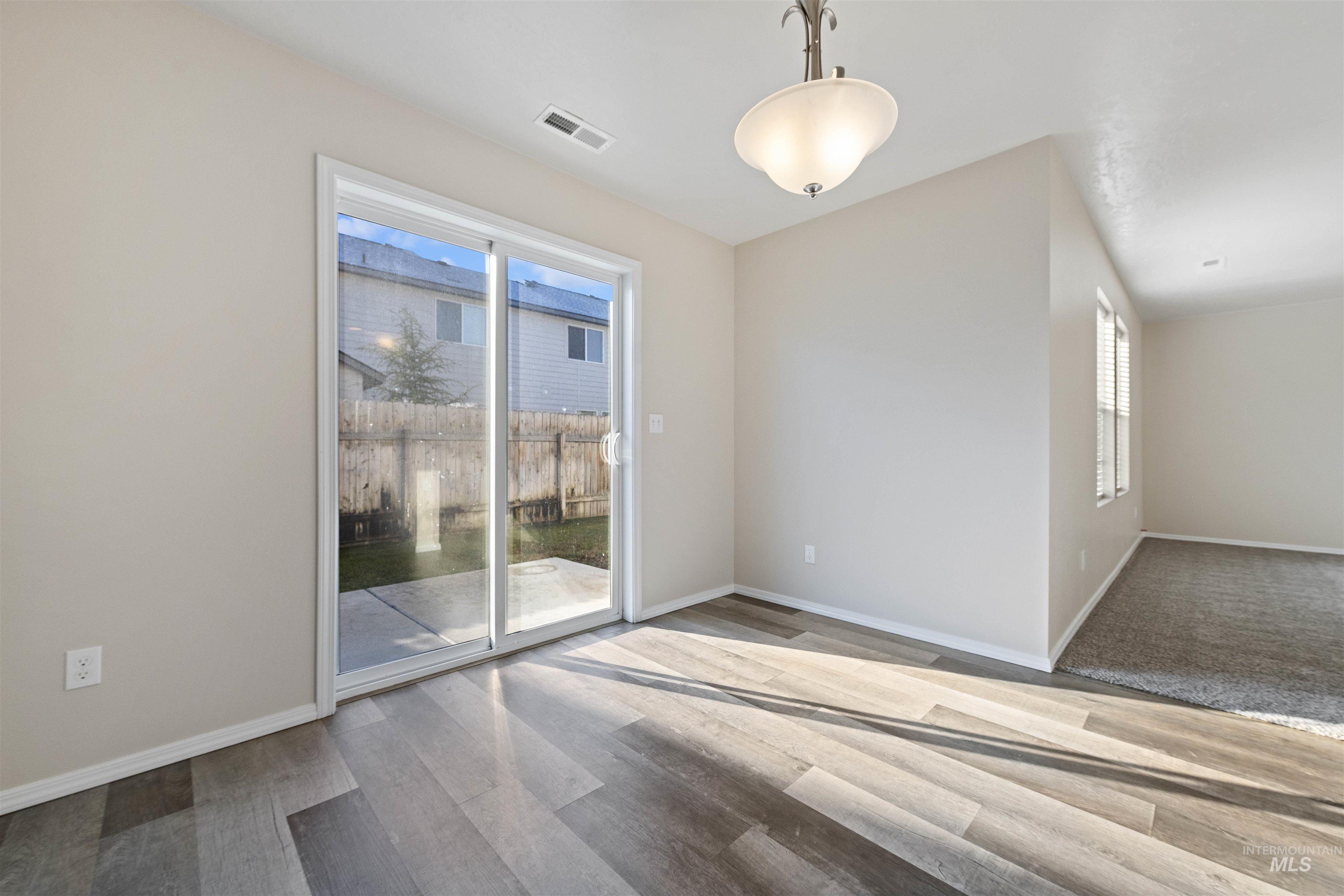 13559 Cocoa Beach Way Caldwell, ID 83607 - Photo 15 of 28 Unfurnished room with baseboards and light wood-style floors