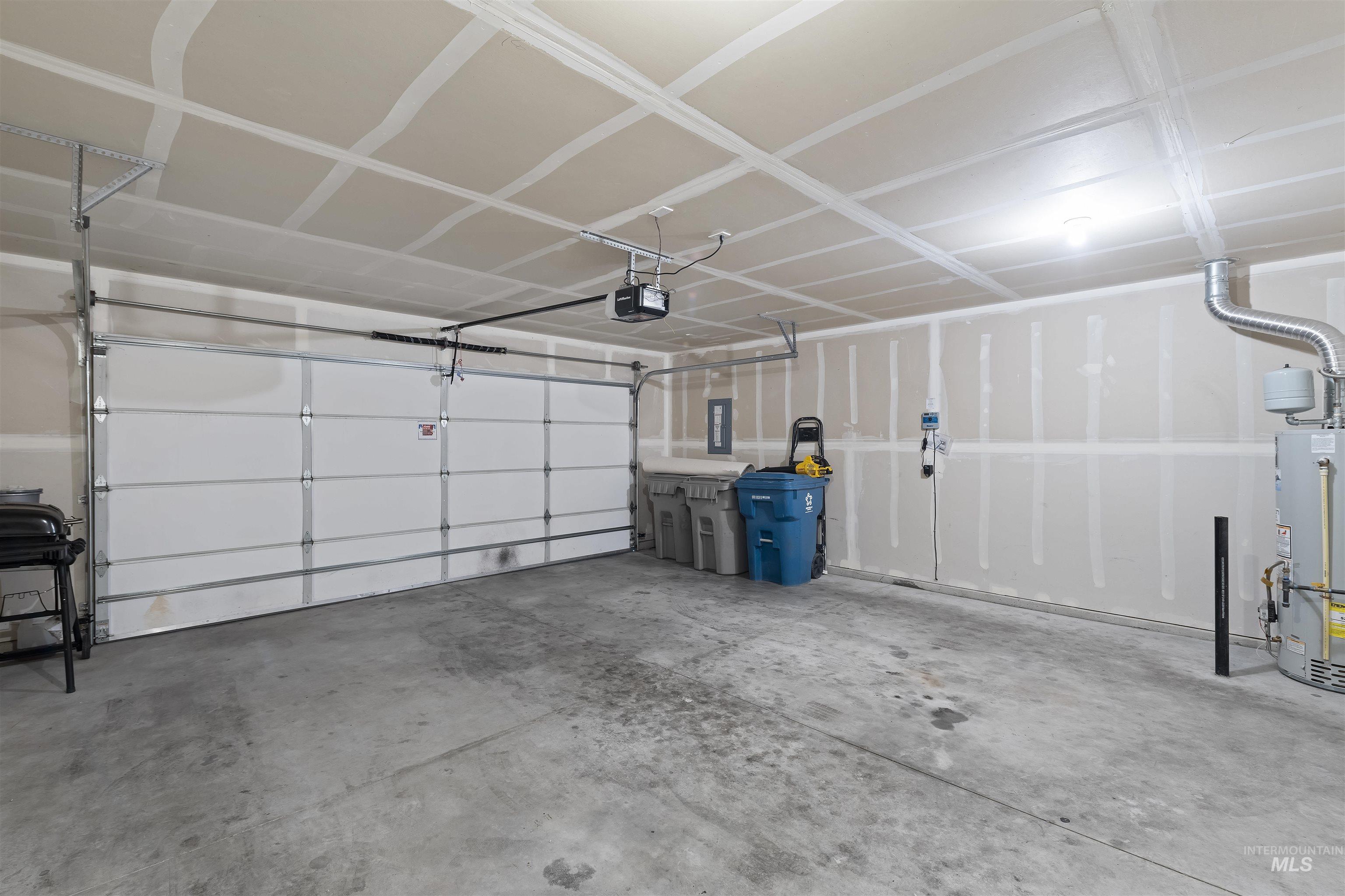 13559 Cocoa Beach Way Caldwell, ID 83607 - Photo 28 of 28 Garage with gas water heater and electric panel