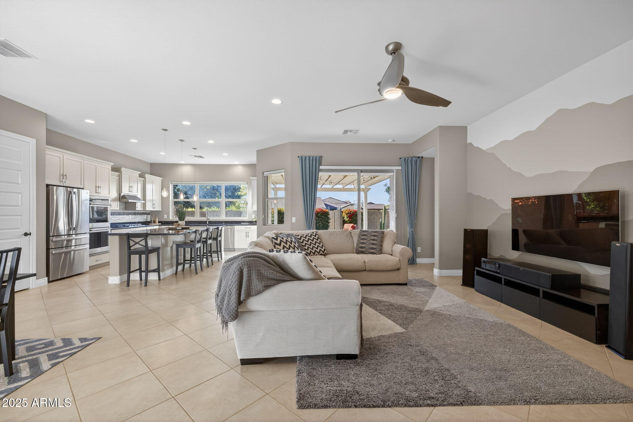 5236 South Excimer Mesa, AZ 85212 - Photo 9 of 85 a living room with furniture and a flat screen tv