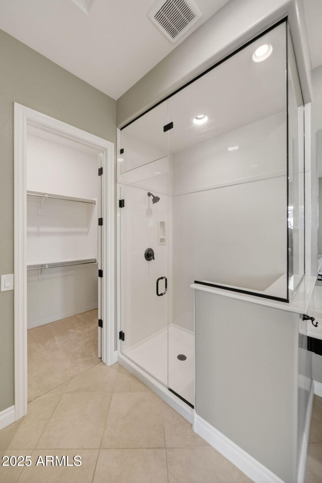 5236 South Excimer Mesa, AZ 85212 - Photo 25 of 85 a bathroom with a shower and a glass door
