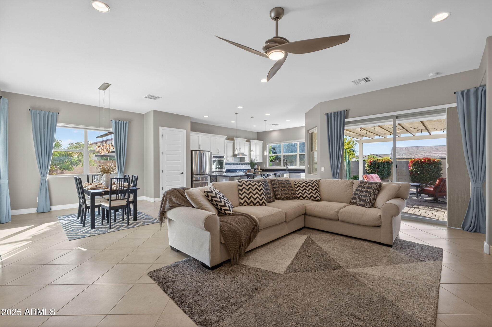 5236 South Excimer Mesa, AZ 85212 - Photo 2 of 85 a living room with furniture and a large window