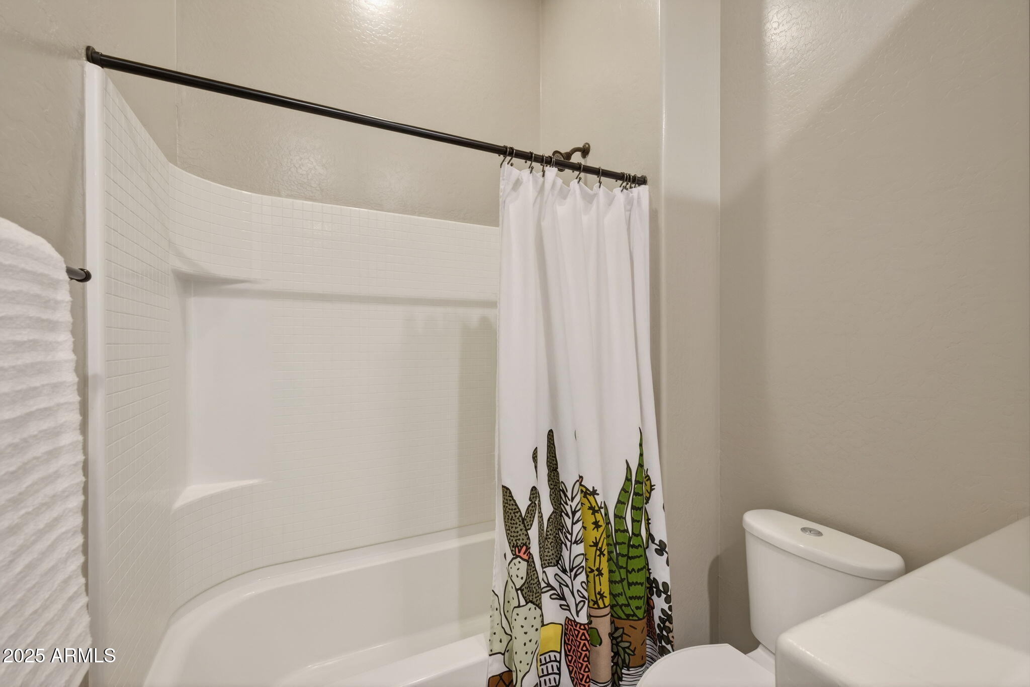 5236 South Excimer Mesa, AZ 85212 - Photo 29 of 85 a bathroom with a shower curtain and a toilet