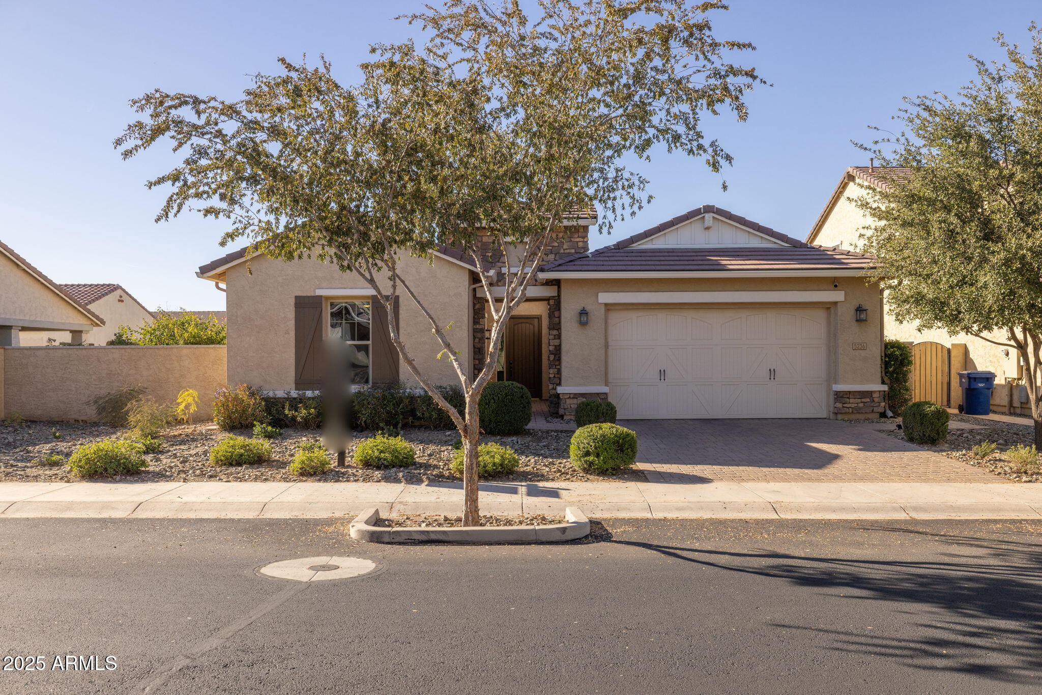 5236 South Excimer Mesa, AZ 85212 - Photo 6 of 85 a front view of a house with a yard and garage