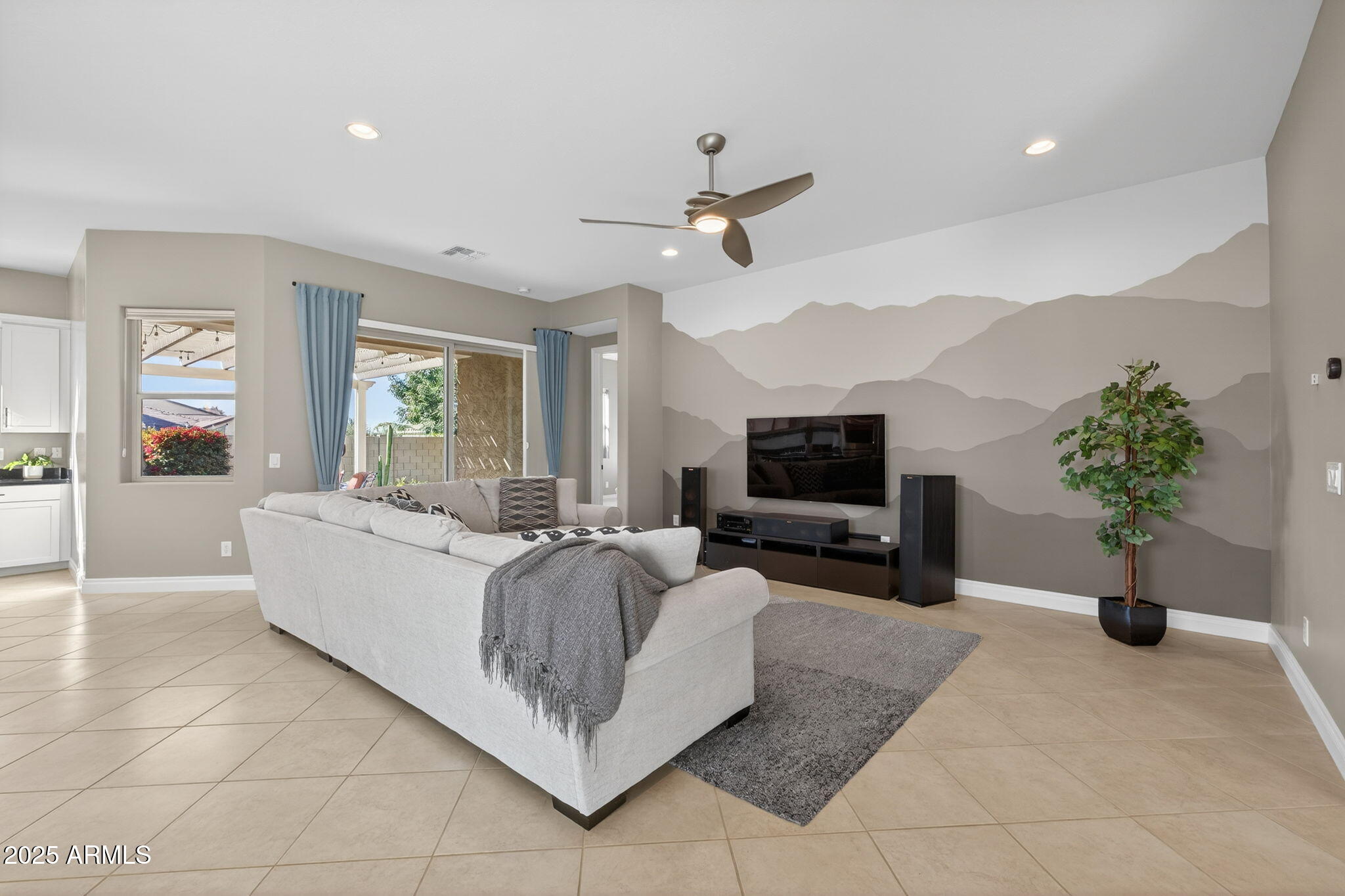 5236 South Excimer Mesa, AZ 85212 - Photo 8 of 85 a living room with furniture and a flat screen tv