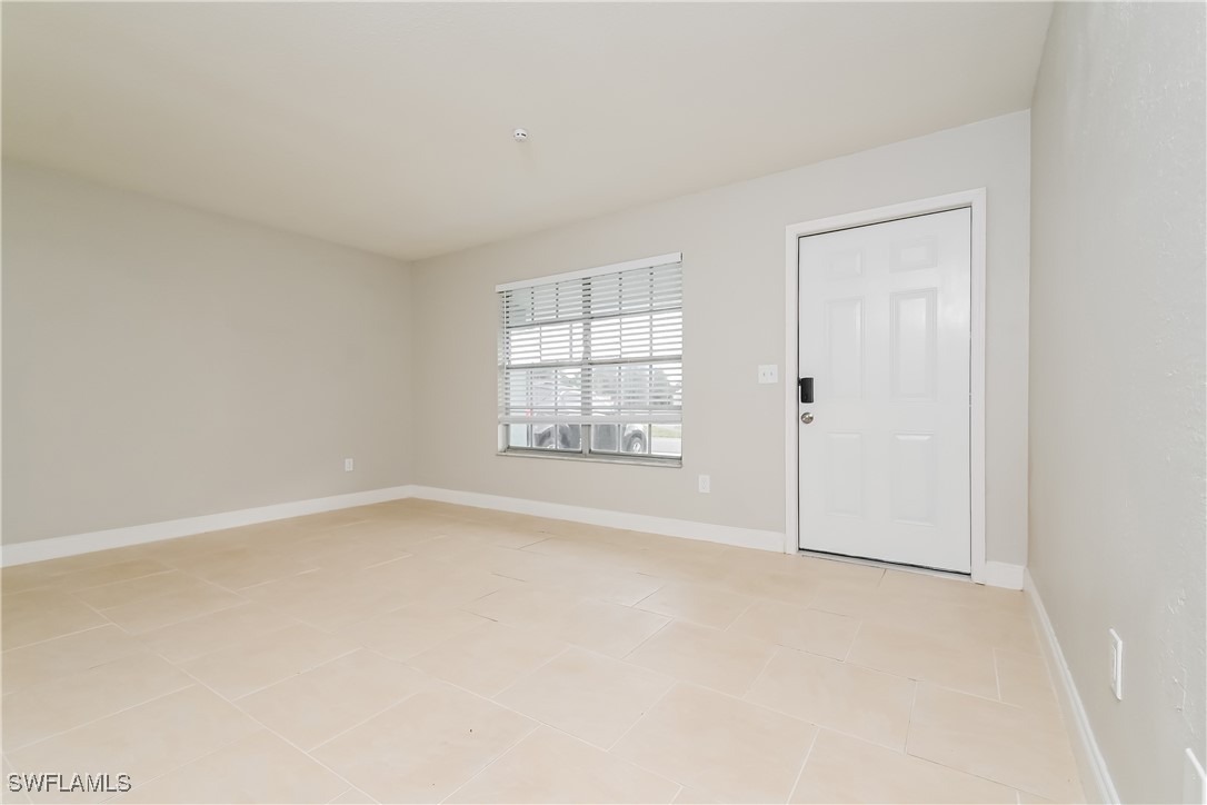 4583 Mongite Road North Port, FL 34287 - Photo 3 of 16 an empty room with windows