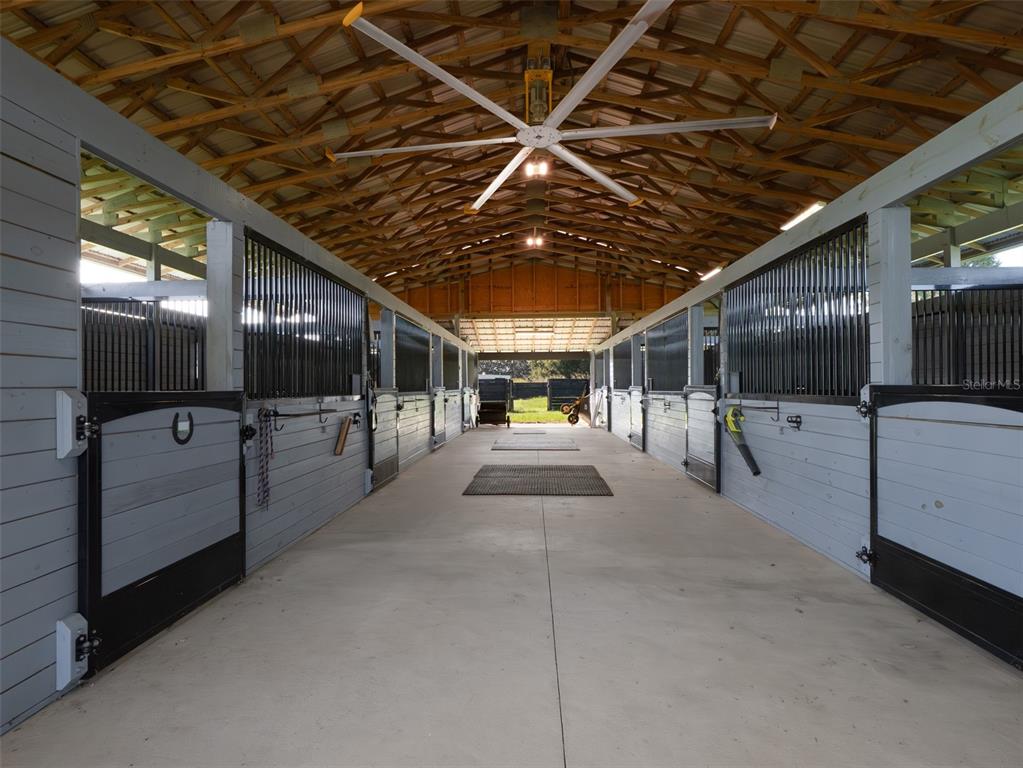5028 West Anthony Road Ocala, FL 34475 - Photo 25 of 31 a view of a porch with furniture