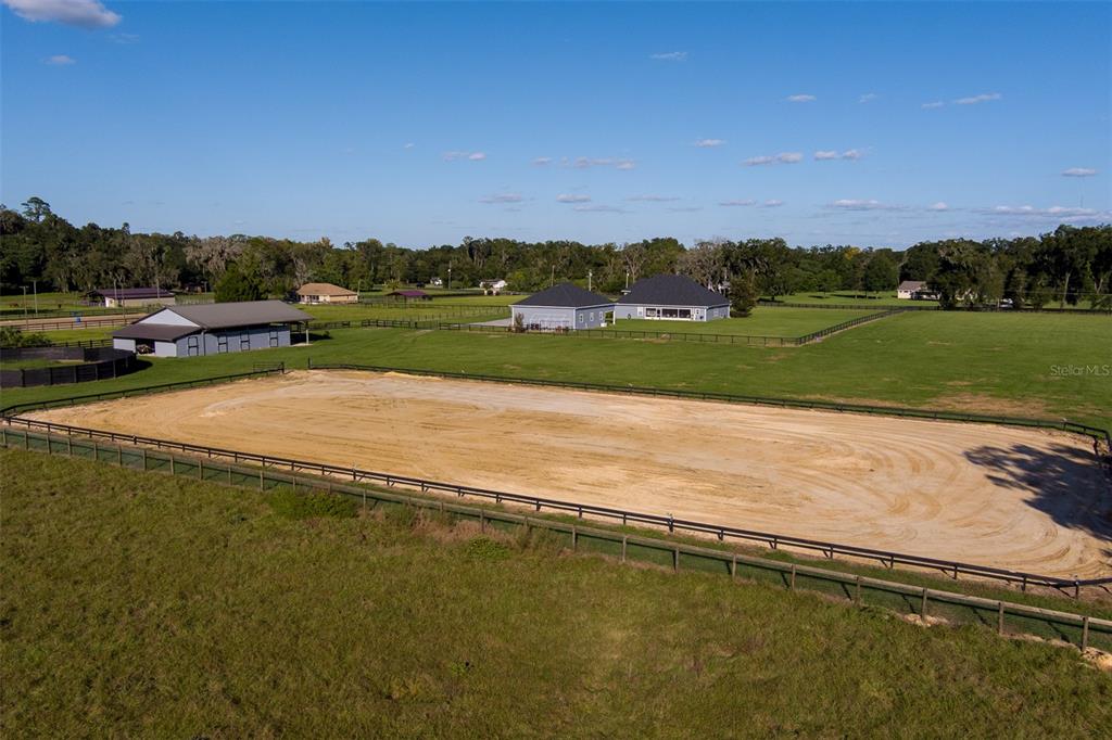 5028 West Anthony Road Ocala, FL 34475 - Photo 29 of 31 a view of a lake with houses in the background