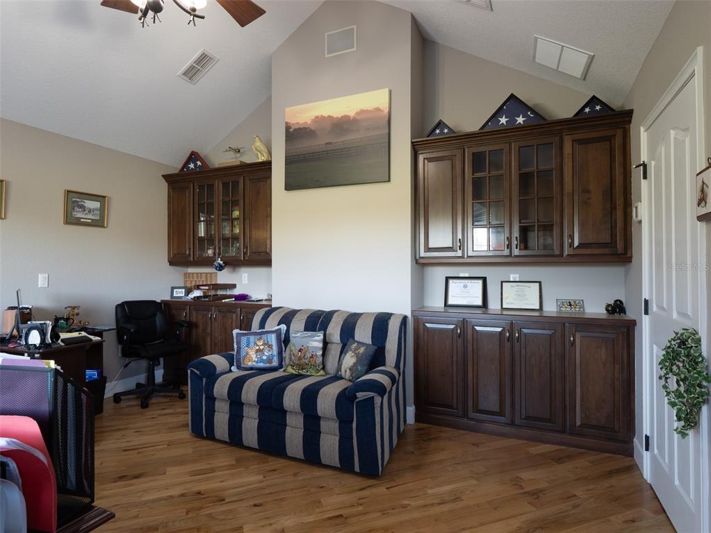 5028 West Anthony Road Ocala, FL 34475 - Photo 7 of 31 a living room with furniture