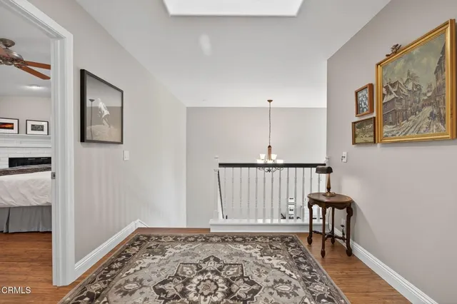 a view of a patio with table and chairs and potted plants