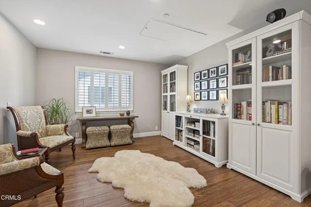 a view of a dining table and chairs in the patio