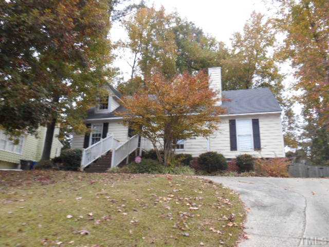 2605 Broadlands Drive Raleigh, NC 27604 - Photo 1 of 3 a front view of a house with a yard and garage