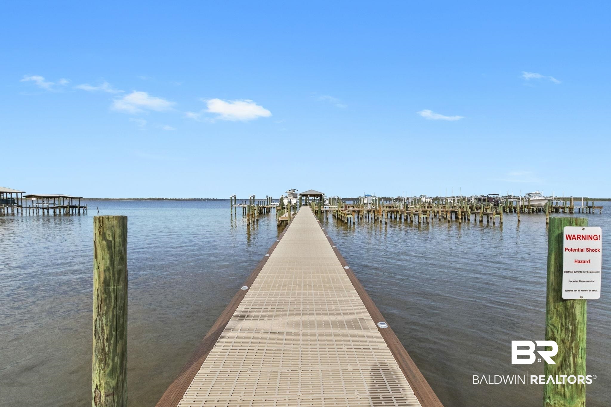 25861 Canal Road, Unit 78 Orange Beach, AL 36561 - Photo 38 of 45 Dock area featuring a water view