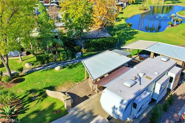 an aerial view of residential house with outdoor space and street view