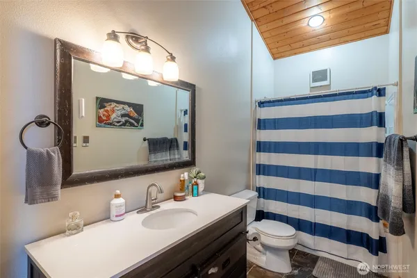 a bed room with a bed and a couch