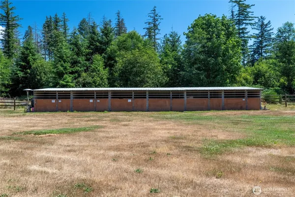 view of house with yard