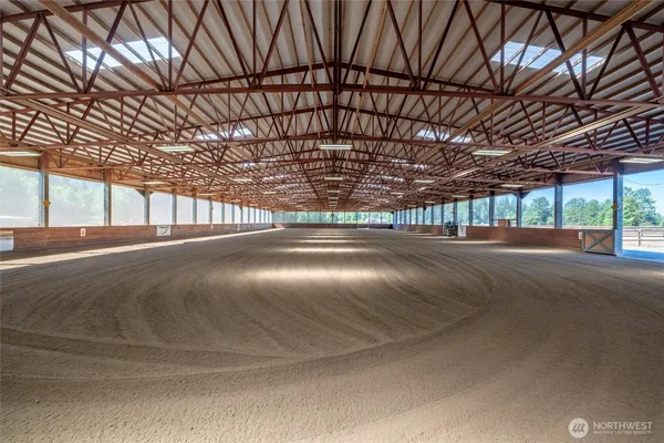 a view of an empty room with a garage