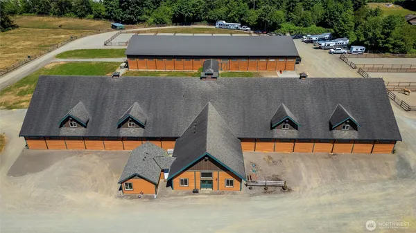 an aerial view of a house with swimming pool