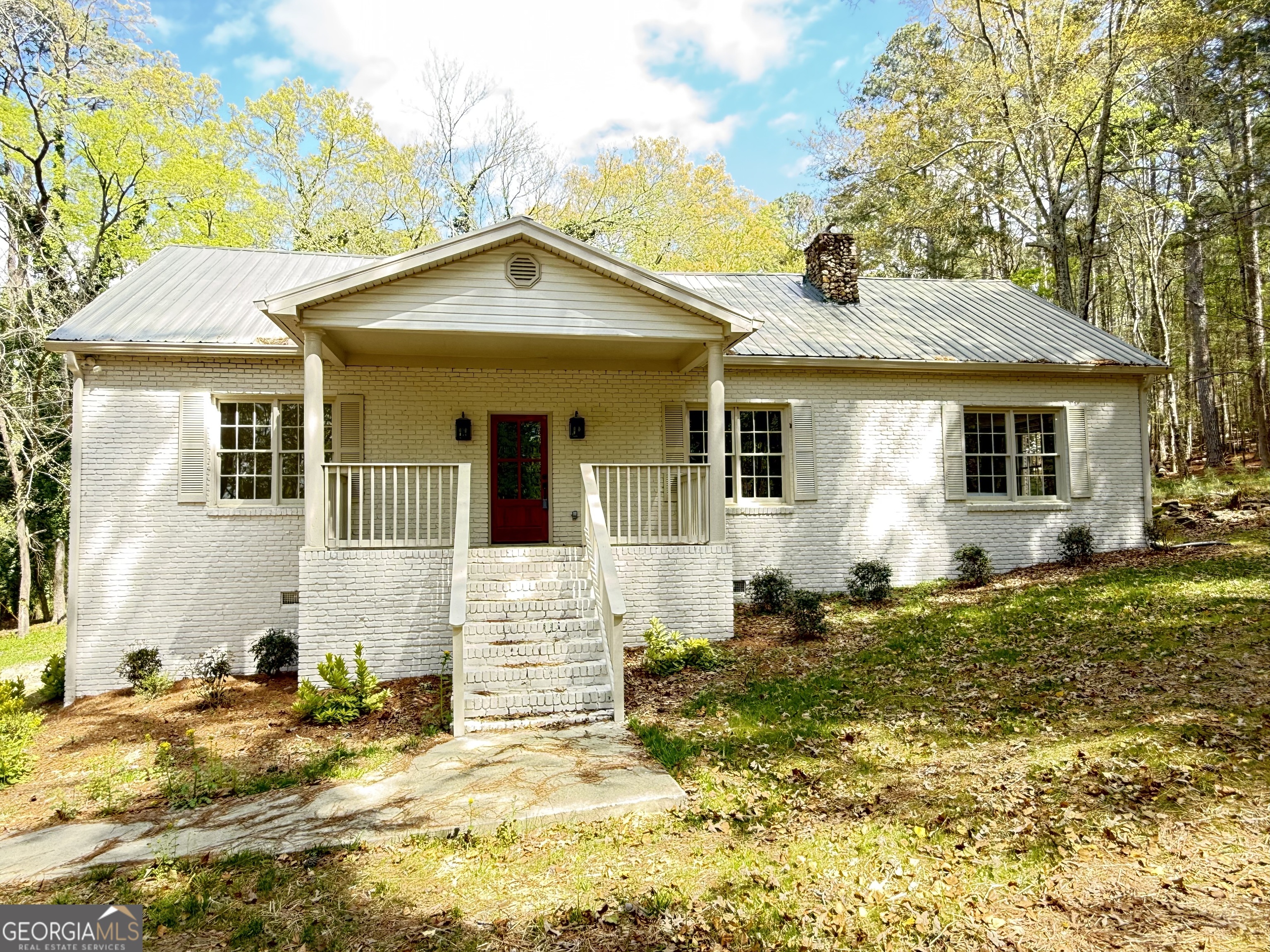 205 Mt Alto Road Southwest Rome, GA 30165 - Photo 2 of 36 a front view of a house with a yard