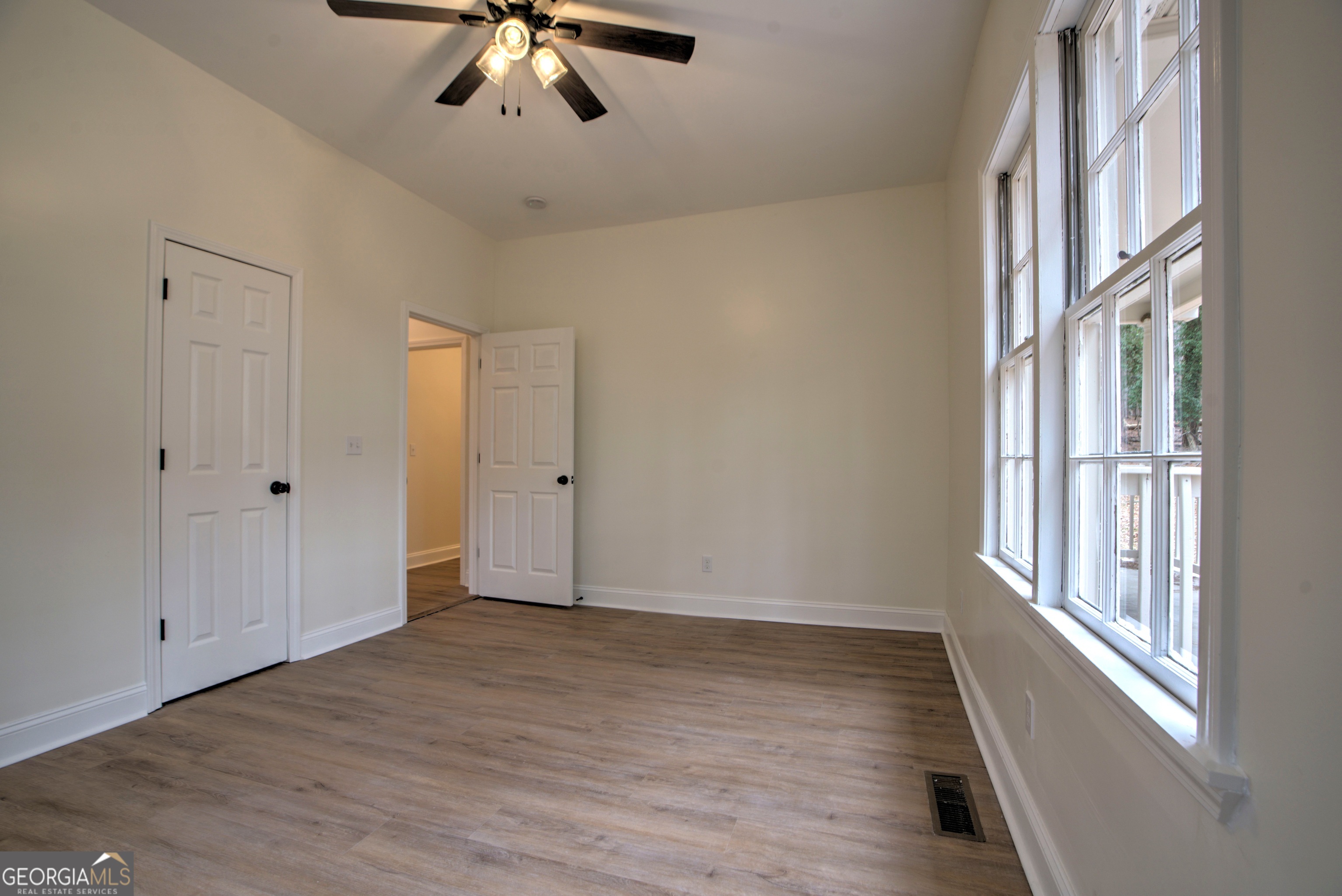 205 Mt Alto Road Southwest Rome, GA 30165 - Photo 21 of 36 a view of an empty room with a window