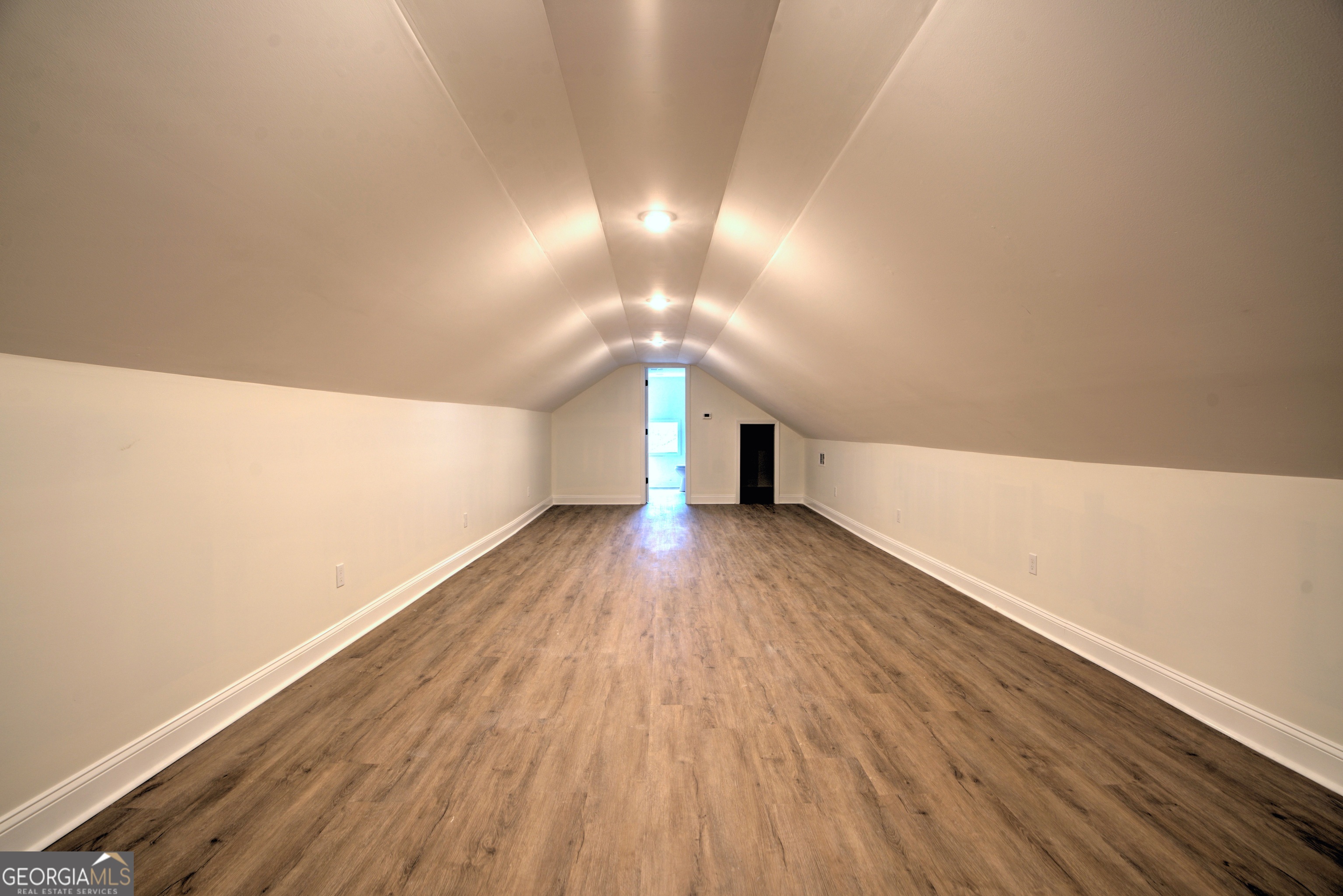 205 Mt Alto Road Southwest Rome, GA 30165 - Photo 27 of 36 a view of empty room with wooden floor