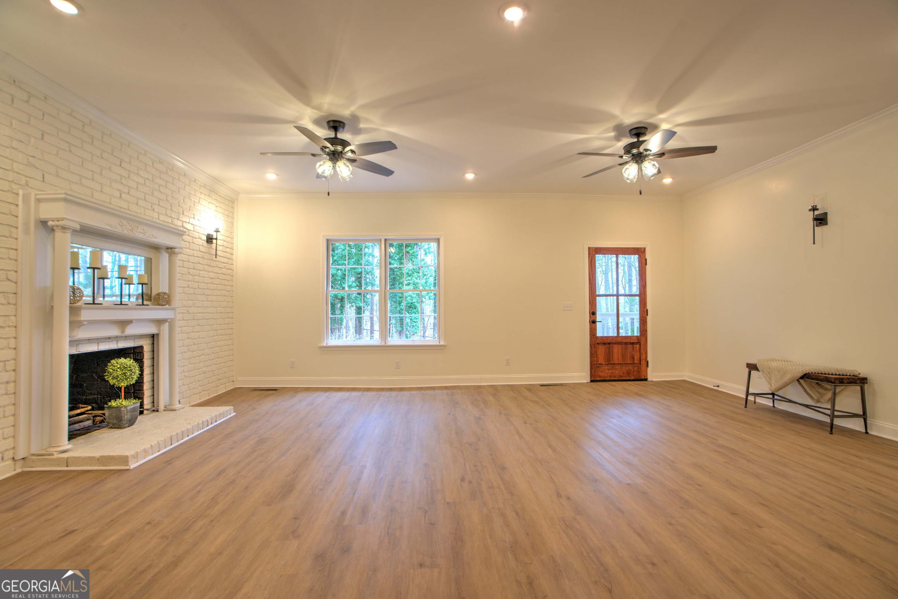 205 Mt Alto Road Southwest Rome, GA 30165 - Photo 7 of 36 wooden floor in an empty room with a fireplace