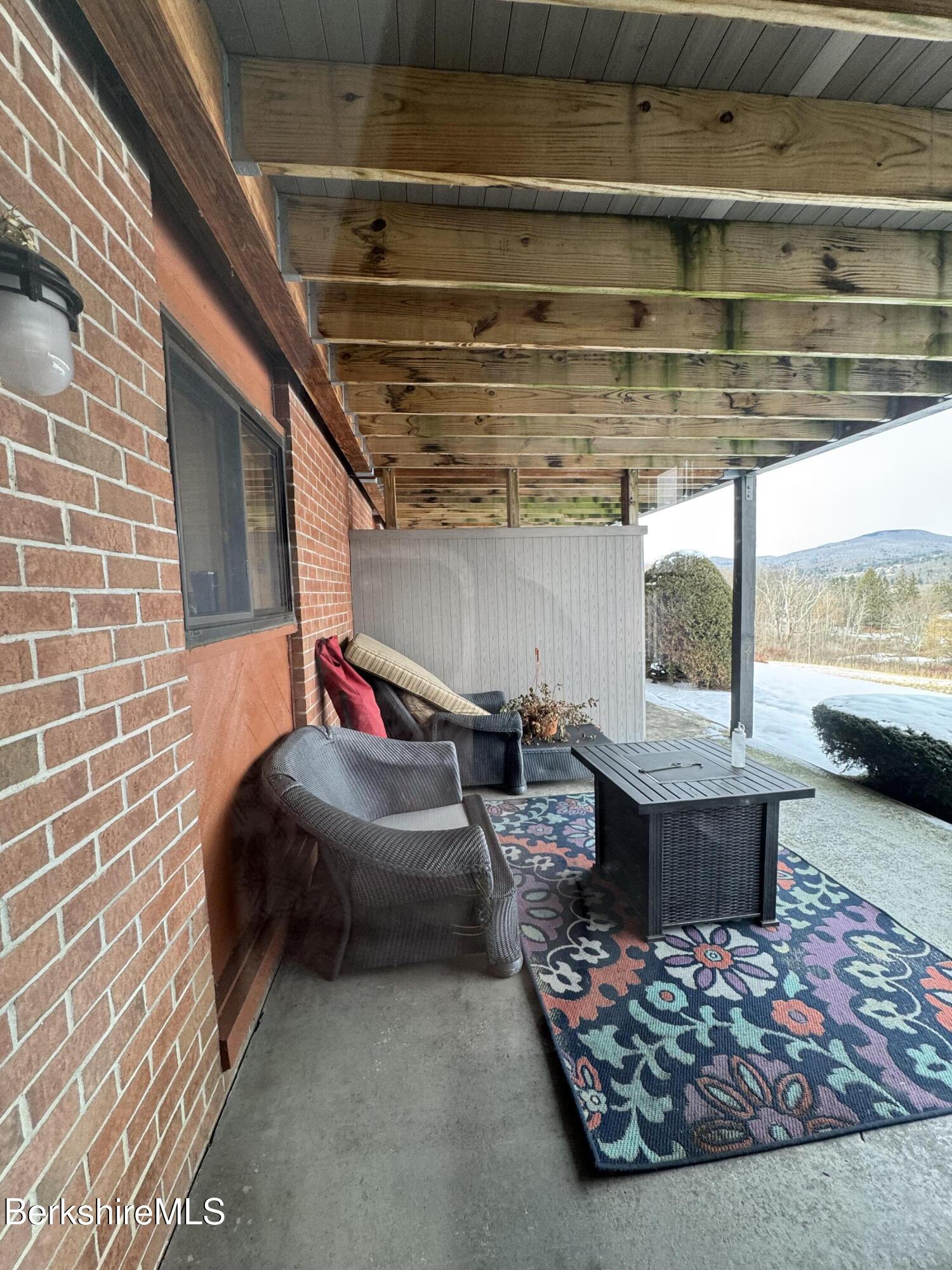 189 Stratton Road Williamstown, MA 01267 - Photo 12 of 13 a living room with furniture and a window