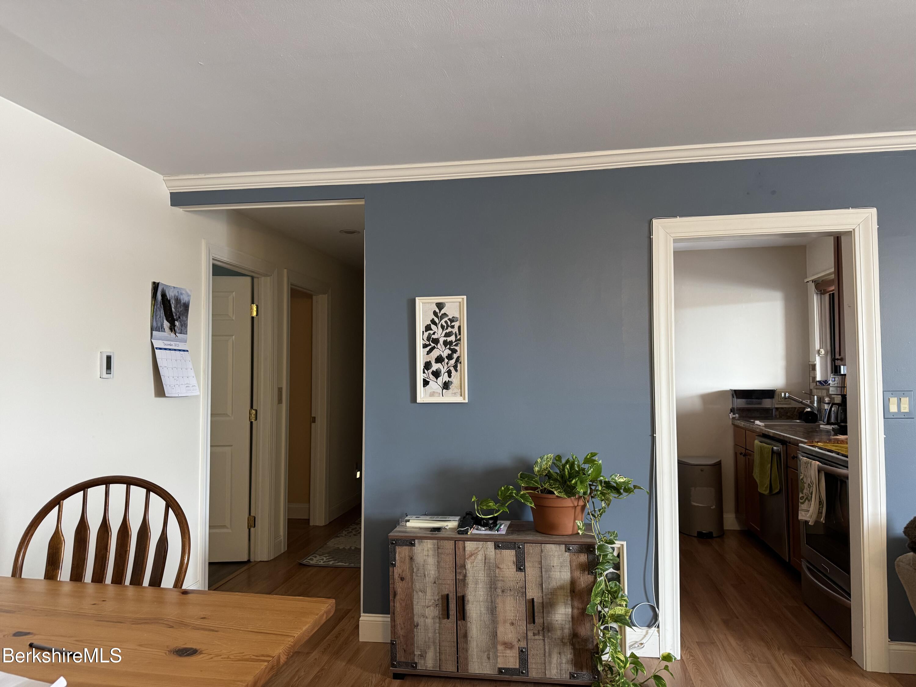 189 Stratton Road Williamstown, MA 01267 - Photo 7 of 13 a view of a hallway to a livingroom with furniture