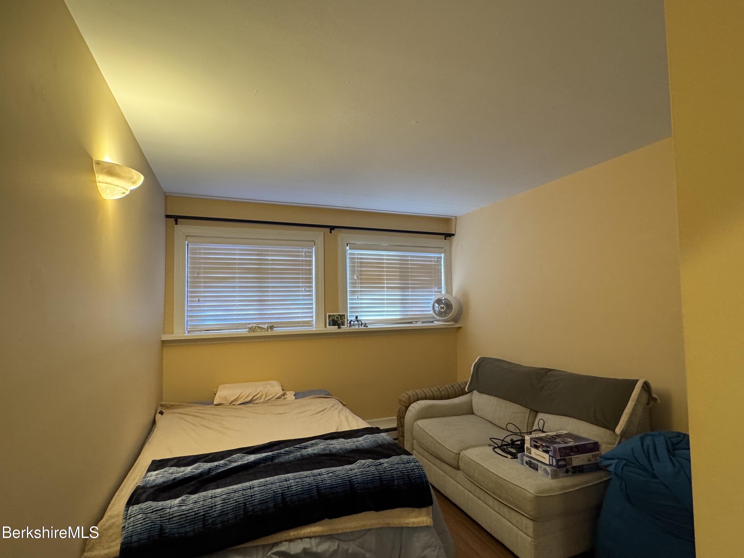 189 Stratton Road Williamstown, MA 01267 - Photo 10 of 13 a bedroom with a bed and furniture