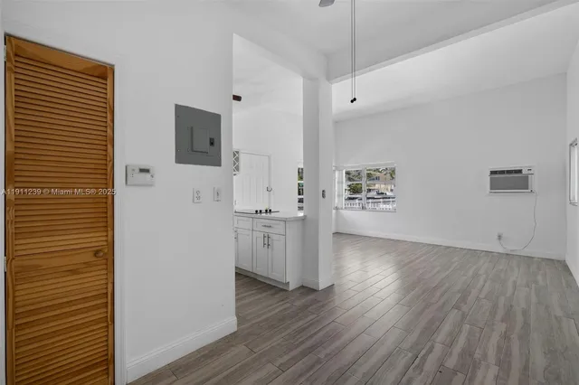 a view of kitchen with wooden floor
