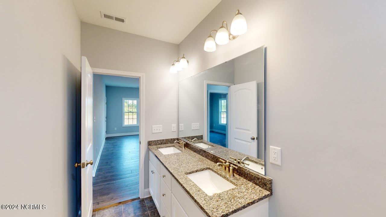 1483 Lancaster Road Pikeville, NC 27863 - Photo 30 of 40 Hall Bathroom